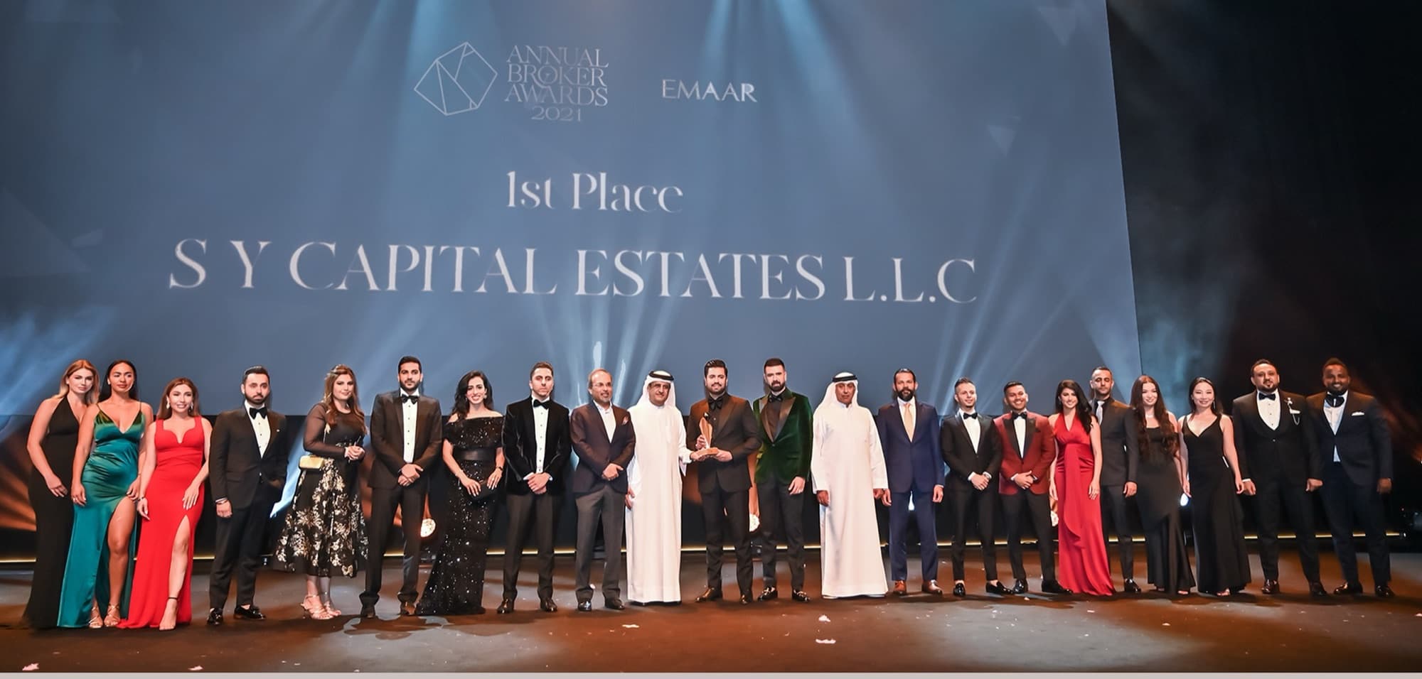 The SY Capital Estates team collecting 1st Place at the Emaar Annual Broker Awards 2021